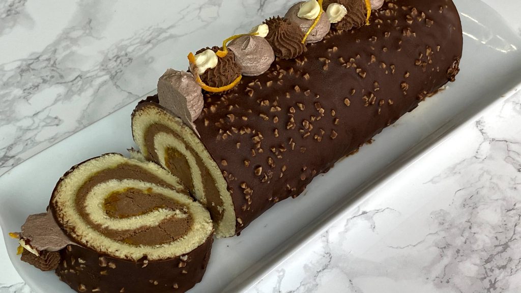 Chocolate Roll Cake with Candied Orange and Rocher Glaze - CookingFantasies